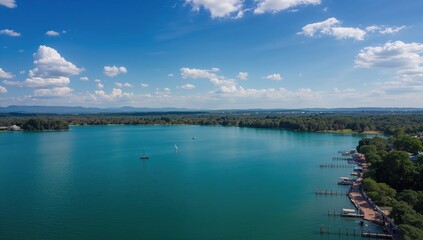 Aerial view of a tranquil lakeside landscape, showcasing natural beauty and seasonal change