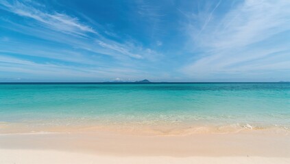 Coastal waters, clear skies, and sandy shores in a sunny summer setting