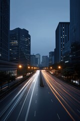 Obraz premium Urban nightscape with light trails in modern city center