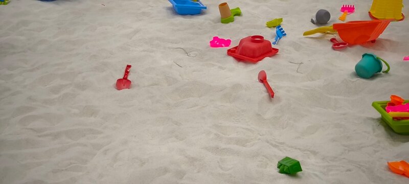 Sand toys for kids at the beach - Powered by Adobe