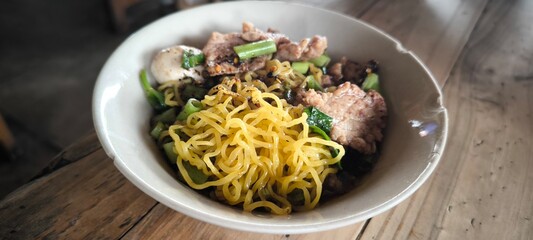 Boat noodles are Thai noodles with a unique flavor. Yellow noodles.