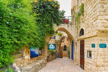 Selbstklebende Fototapeten Enge Straßen  Colorful narrow Arab style streets in the Old City of Jaffa.Israel   © Teo K
