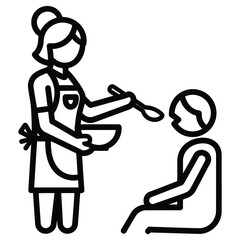 Woman feeding a child with a spoon