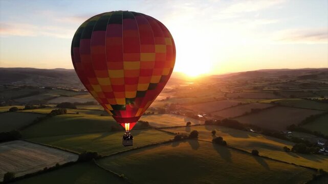 Hot Air Balloon Ride Over Rolling Hills at Sunrise.