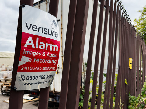 Verisure Alarm Sign on Iron Fence in Manchester UK advertising 24 Hour Security and Recording