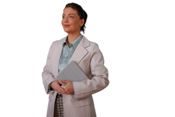 Confident businesswoman smiling, holding a tablet on a transparent background, looking forward with vision and leadership