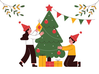 Two people in Santa hats decorate a Christmas tree with ornaments and gifts.