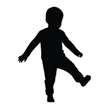 Silhouette of a toddler boy taking a step child walking