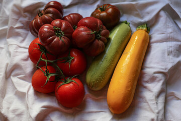 fresh vegetables on the table tomatos and zucchini