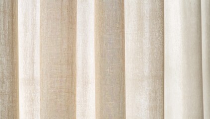 Fototapeta premium Close-up of a sheer light beige curtain with woven texture, ideal for enhancing natural light in a room