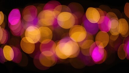 Glowing circular bokeh lights in shades of pink, yellow, purple, and gold against a dark backdrop