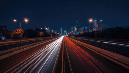 Illuminated car trails at night, long exposure technique, dynamic motion effect