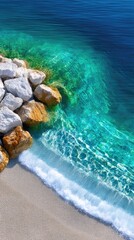 Turquoise Ocean Waters Gently Lapping a Rocky Shoreline with White and Brown Stones on a Sunny Day