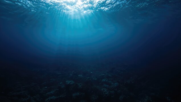 Vast deep blue ocean water creating a serene background, ideal for editorial use