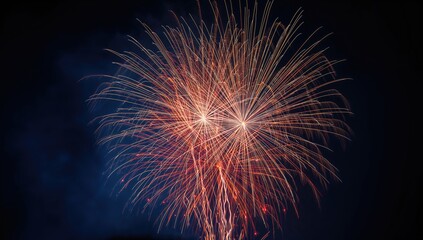 Obraz premium Colorful fireworks create a vibrant light display against a dark sky backdrop, ideal for celebratory themes