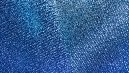 Blue backdrop featuring metallic mesh texture