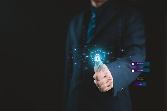 Businessman using fingerprint scan for cybersecurity login authentication on digital interface, symbolizing data protection, privacy, and secure technology concept.