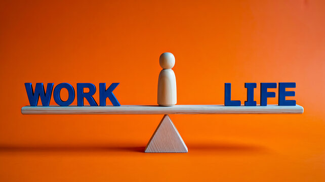 Wooden figure balancing work and life on seesaw symbolizing balance and wellbeing
