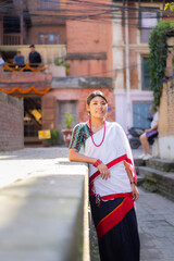 Newari Girl in Traditional Attire Strolling Through Patan Durbar Square