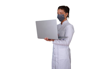Doctor woman in lab coat and face mask using a laptop, practicing telemedicine, healthcare technology on transparent background