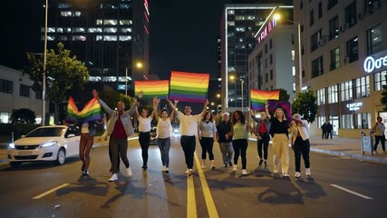 Celebrating unity and love at night with vibrant rainbow flags in the heart of the city during Pride festivities
