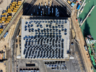 Car parking at the port. Delivery of cars by ship. Cars background. Car parking.