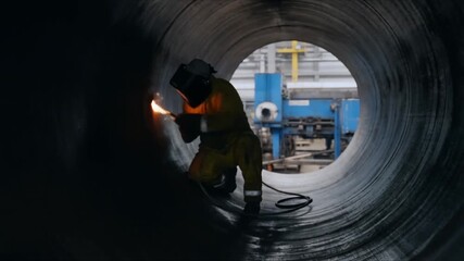 Skilled welder in protective gear meticulously crafts large industrial pipe, sparks flying in a modern manufacturing facility, showcasing precision engineering and heavy industry production in action. - Powered by Adobe