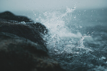 water splash on rocks