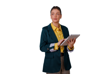 Young businesswoman standing, using a digital tablet for work, planning, and accessing information with a transparent background