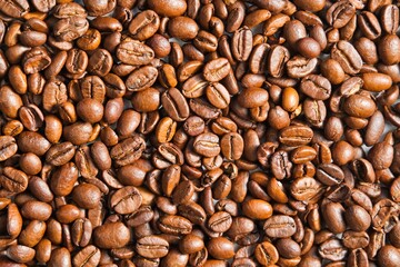 Top view of aromatic roasted coffee beans.