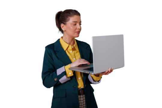 Businesswoman standing, typing on laptop, reviewing data, working remotely with transparent background - Powered by Adobe