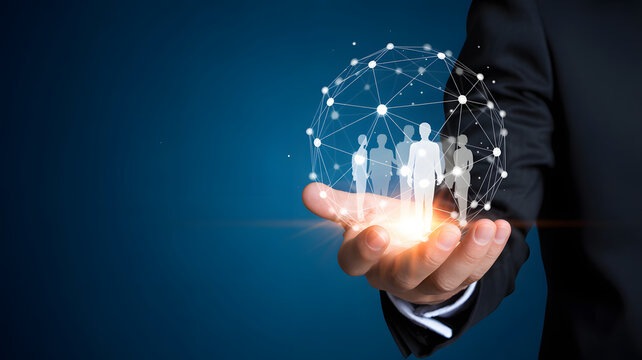 Empowering your team for success with global networking and connection, shown in a hand with bright glow and dark background, creating a professional feel