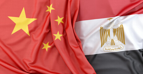 Flags of China and Egypt lying together. 3D rendering