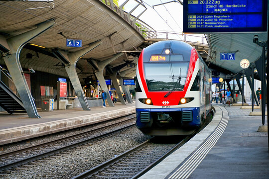 Stadelhofen Station in Zurich with Swiss train