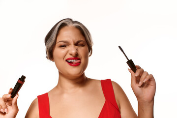 Obraz premium Young woman embraces beauty with red lips and unique features in stunning portrait