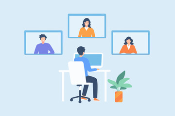 Man participating in a video conference call with colleagues working remotely from home