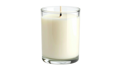 Cylinder glass candle with wick and creamy wax against a black backdrop, clean and simple