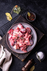 Raw chopped meat with spices