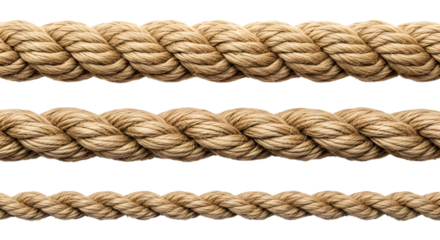 Close up macro view of three natural fiber ropes of varying thickness against a dark background