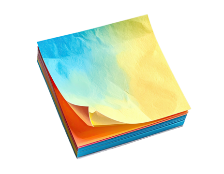 A vibrant stack of paper with a folded top sheet, showcasing a spectrum of color