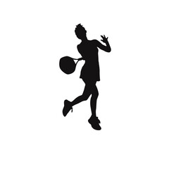 Obraz premium Silhouette of a soccer player jumping to head the ball during a game