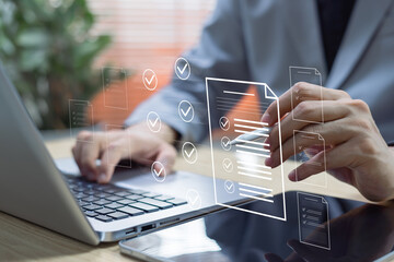 Assurance and checklist concept. Business professional managing documents, planning goals, writing notes, and tracking job progress for effective project management and performance improvement.