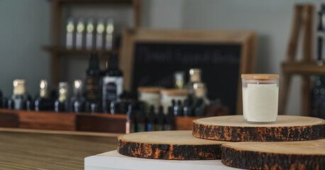a not yet lite scented candle surround by natural dry flower