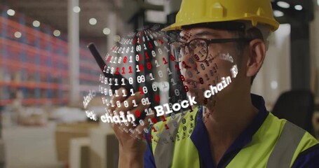 Warehouse man raising radio and speaking, managing logistics as Block chain sphere overlaying radio - Powered by Adobe