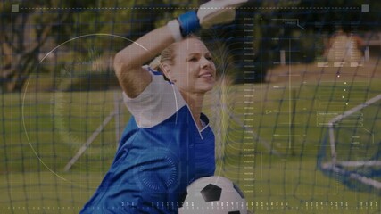 Ball approaching female GK reaching, catching and securing, stopping goal with HUD overlay tracking