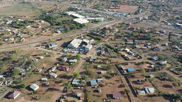 aerial view Serowe hills Botswana, village houses residential, with dirt roads, daytime, rural area