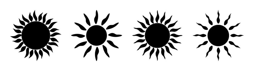 Four stylized black sun icons with rays radiating outward on a