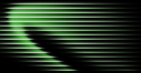 Dynamic green light filtering through modern blinds creates a dramatic shadow play, perfect for backgrounds or adding depth to your project