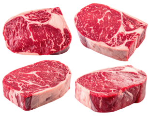 Four uncooked ribeye steaks with marbled texture against a transparent background