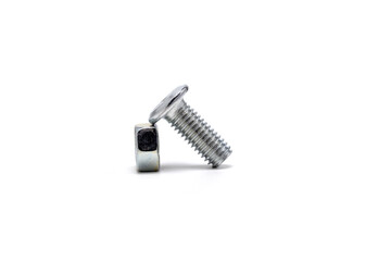 Flat head machine bolt with hex nut on white background